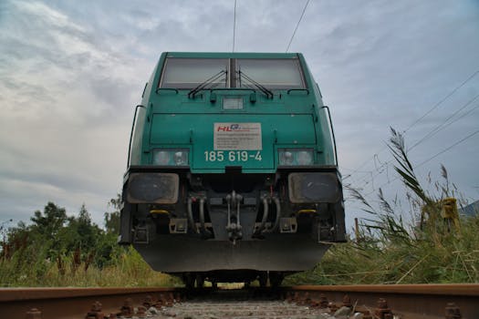 Low angle shot of a powerful locomotive on railway tracks in Wismar, Germany.