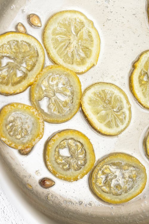 Foto stok gratis irisan lemon, jeruk, lemon