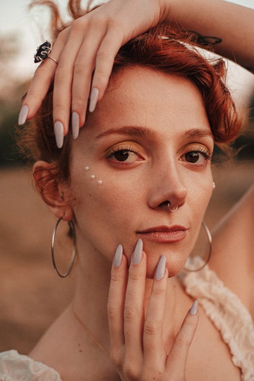 Close-up Portrait of Redhead Woman Posing