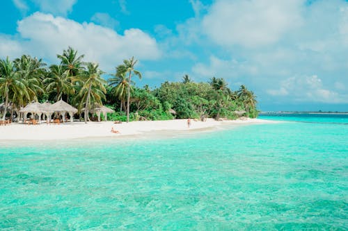 Free Scenic View of an Island with White Sand Beach Stock Photo