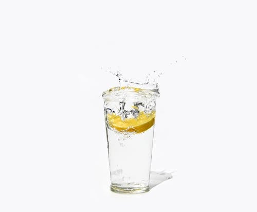 Sliced Lemon on a Glass of Water