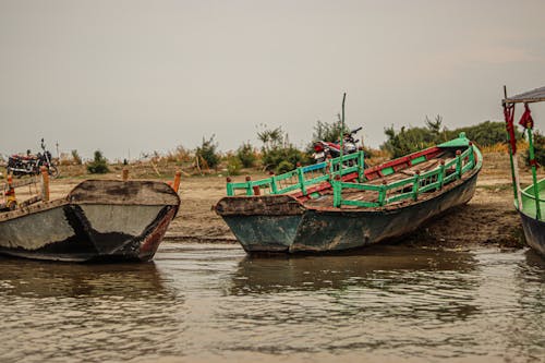 Old Wooden Boats Docked on the Shore