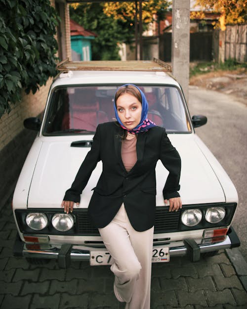 Woman Posing on Car