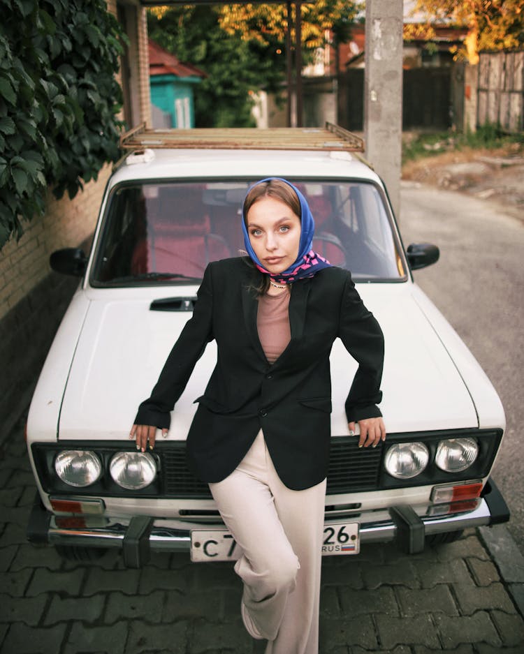 Woman Posing On Car