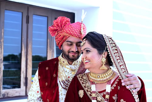 Couple Wearing Traditional Wedding Clothes