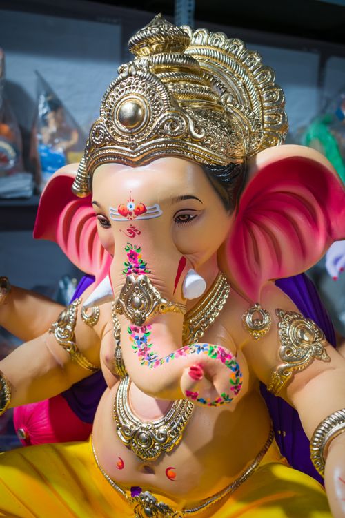 Free Colorful and ornate Ganesh statue symbolizing Indian culture and spirituality at a festival in Mumbai. Stock Photo
