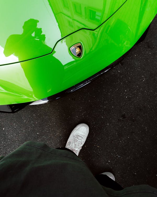 Lamborghini Emblem on a Green Car