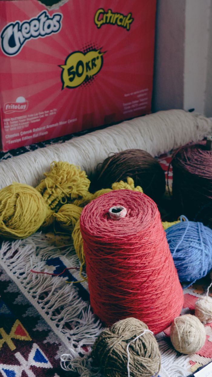 Assorted colourful yarn spools