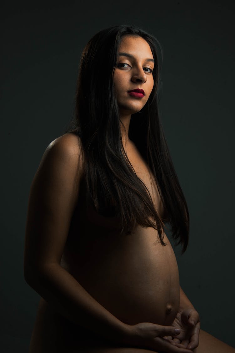 Naked Pregnant Woman Posing