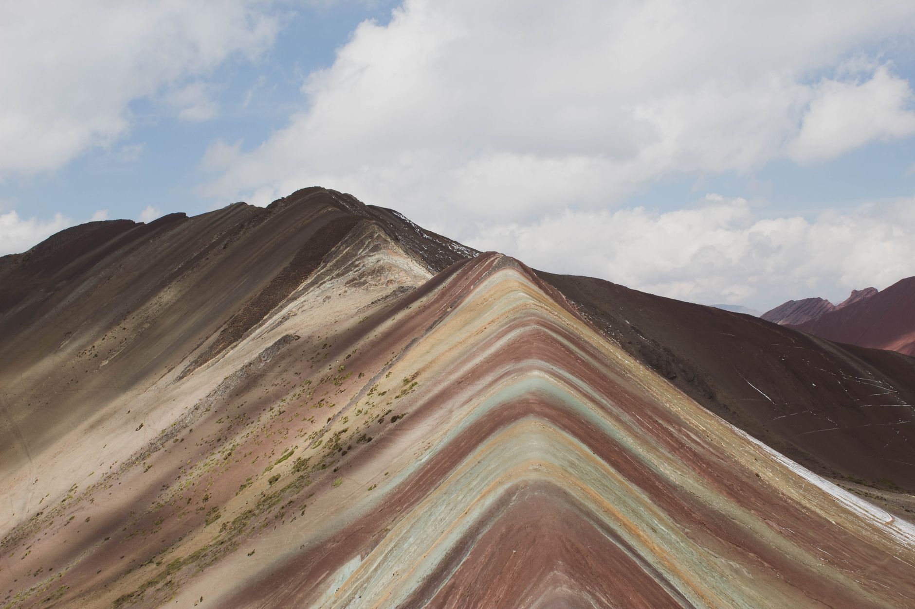 rainbow mountain vinicunca cusco peru colored andean ridge hikers