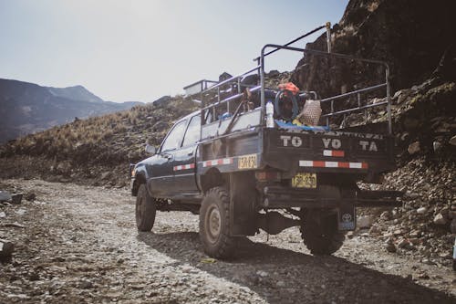 A Pickup Truck on a Rocky Road