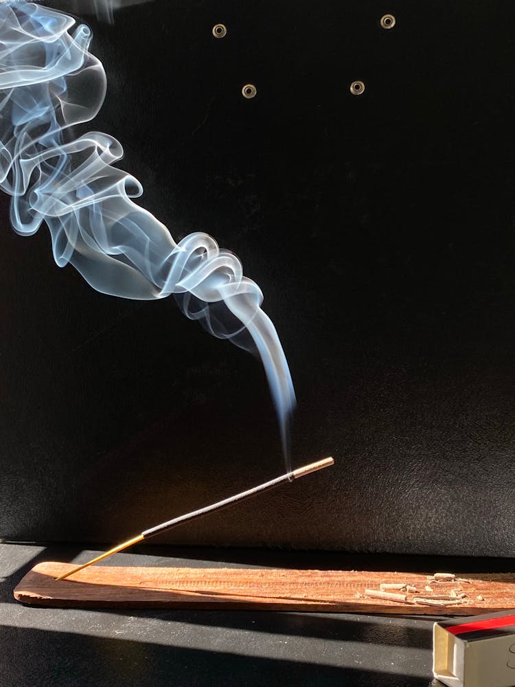 Burning Incense Stick With White Smoke