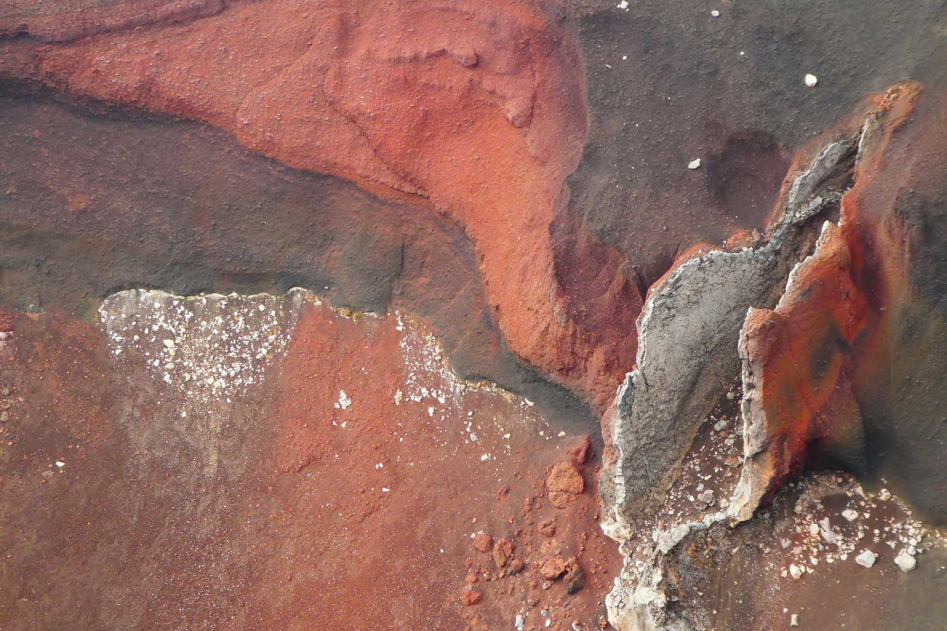 Close-up shot of colorful eroded rock formations showcasing natural patterns and textures.