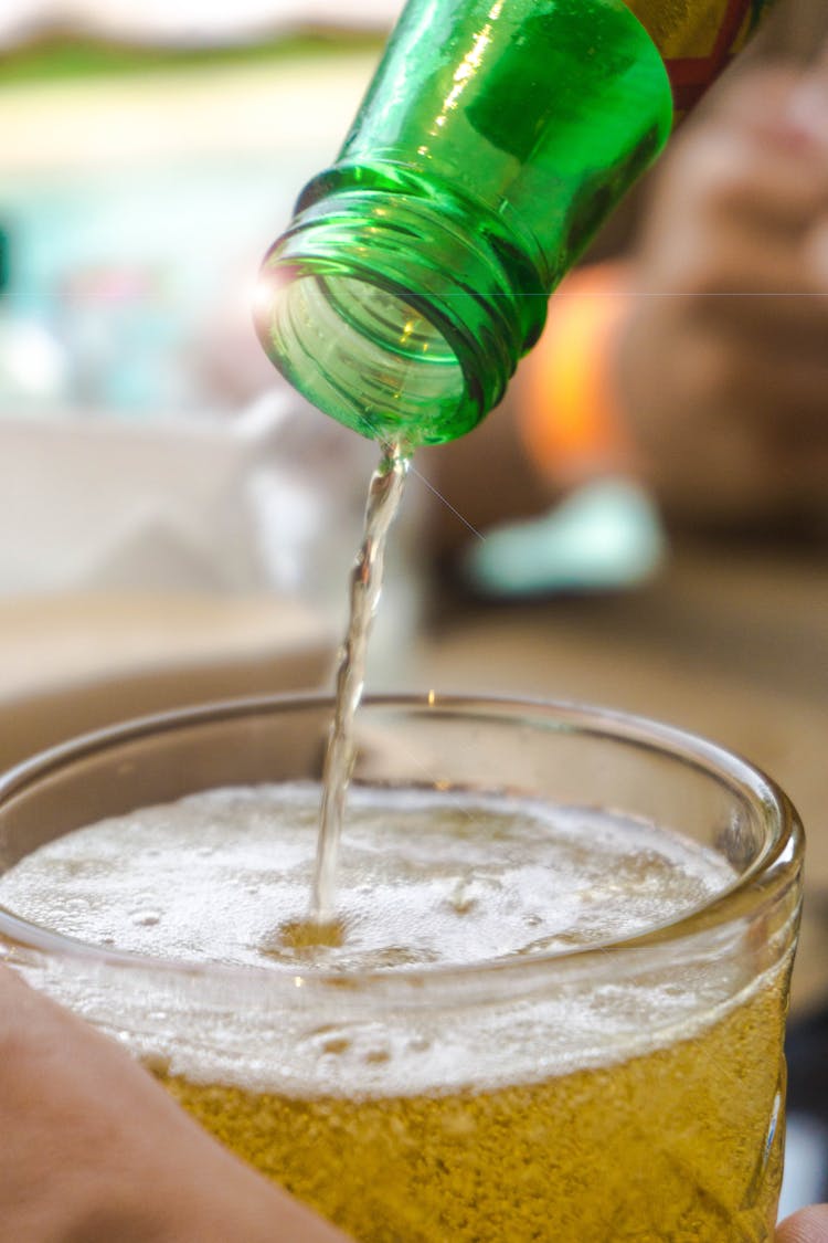 Pouring Beer In A Glass