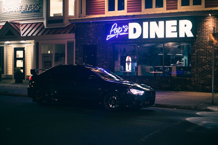 Black Car In Front Of A Diner