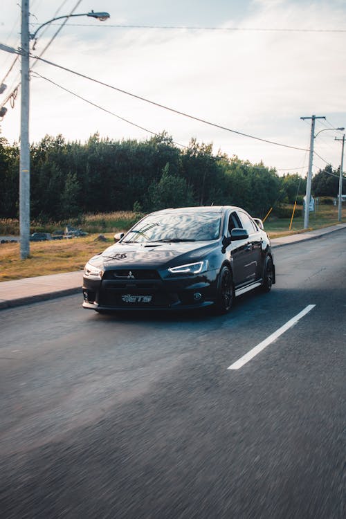 araç kullanmak, dikey atış, mitsubishi lancer evrimi içeren Ücretsiz stok fotoğraf