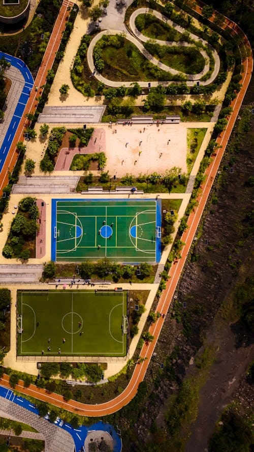 Fotos de stock gratuitas de campo de fútbol, foto con dron, fotografía aérea