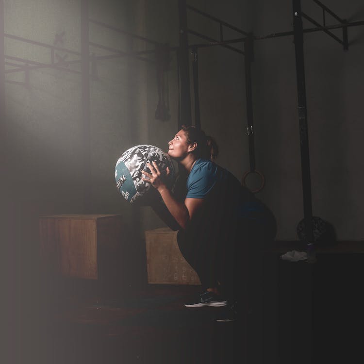 Woman Working Out With A Ball