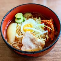 Noodle soup in a red bowl — photo by Kenzo Okuma on Pexels