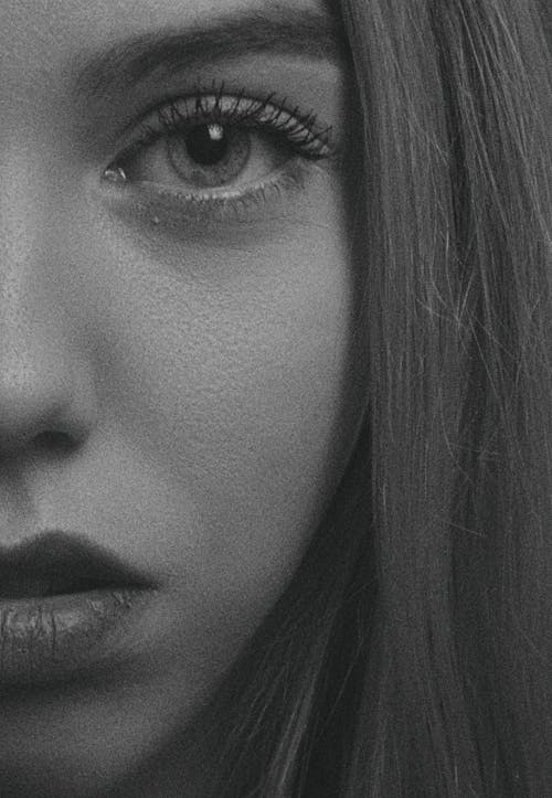 A Grayscale Photo of a Woman's Face