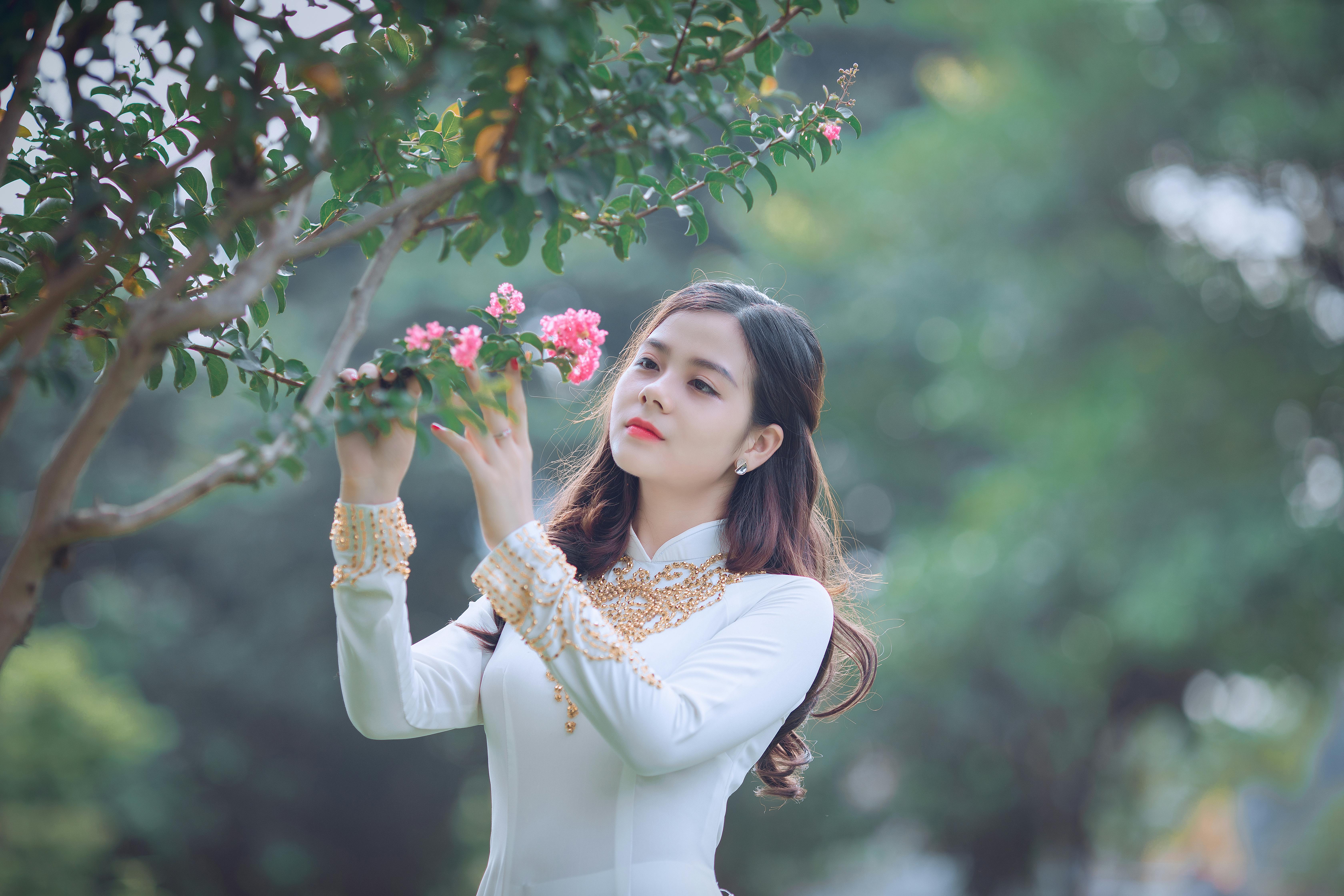 Woman Holding Pink Petaled Flower · Free Stock Photo