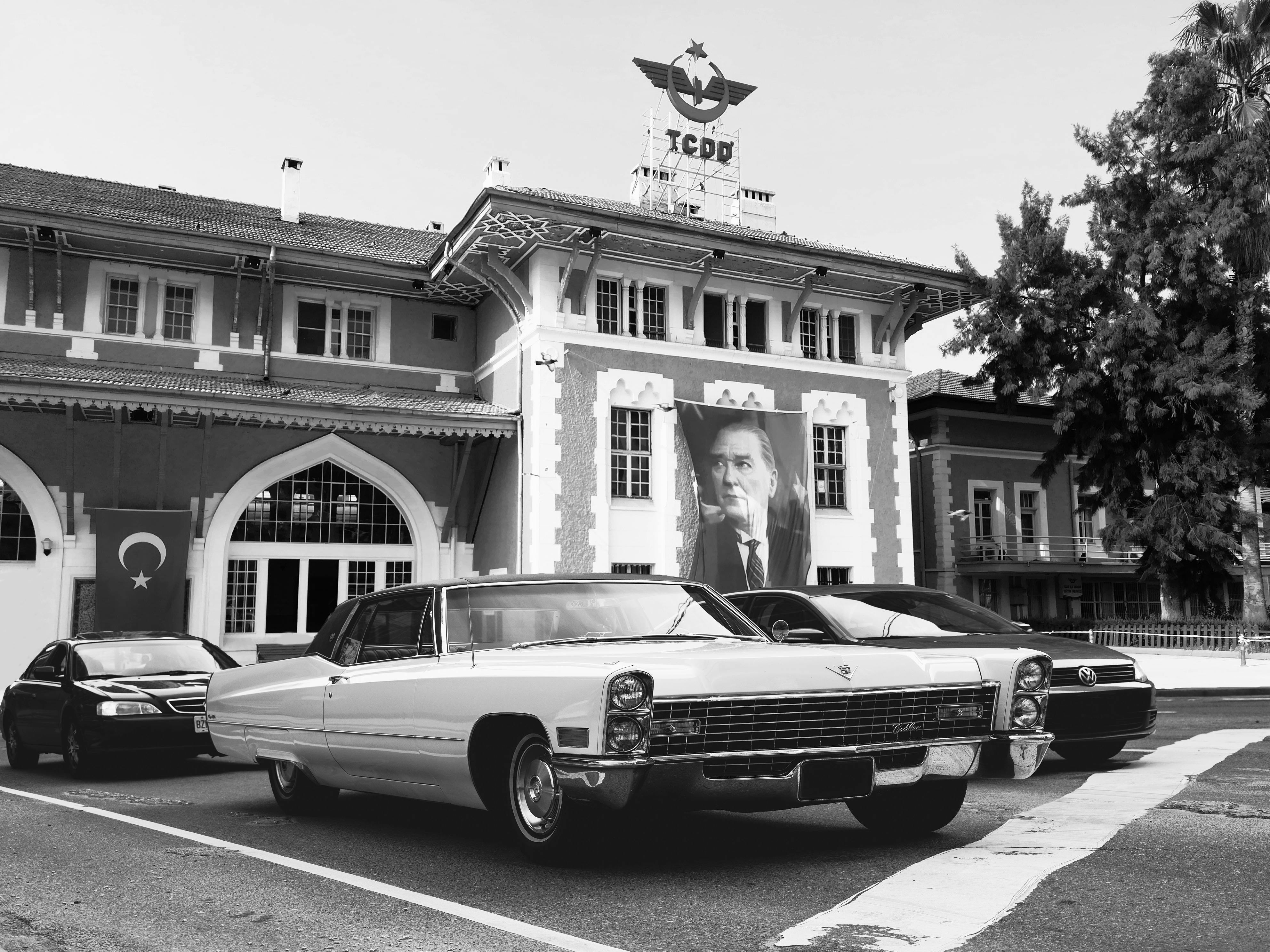 Grayscale photo of a Vintage Car · Free Stock Photo