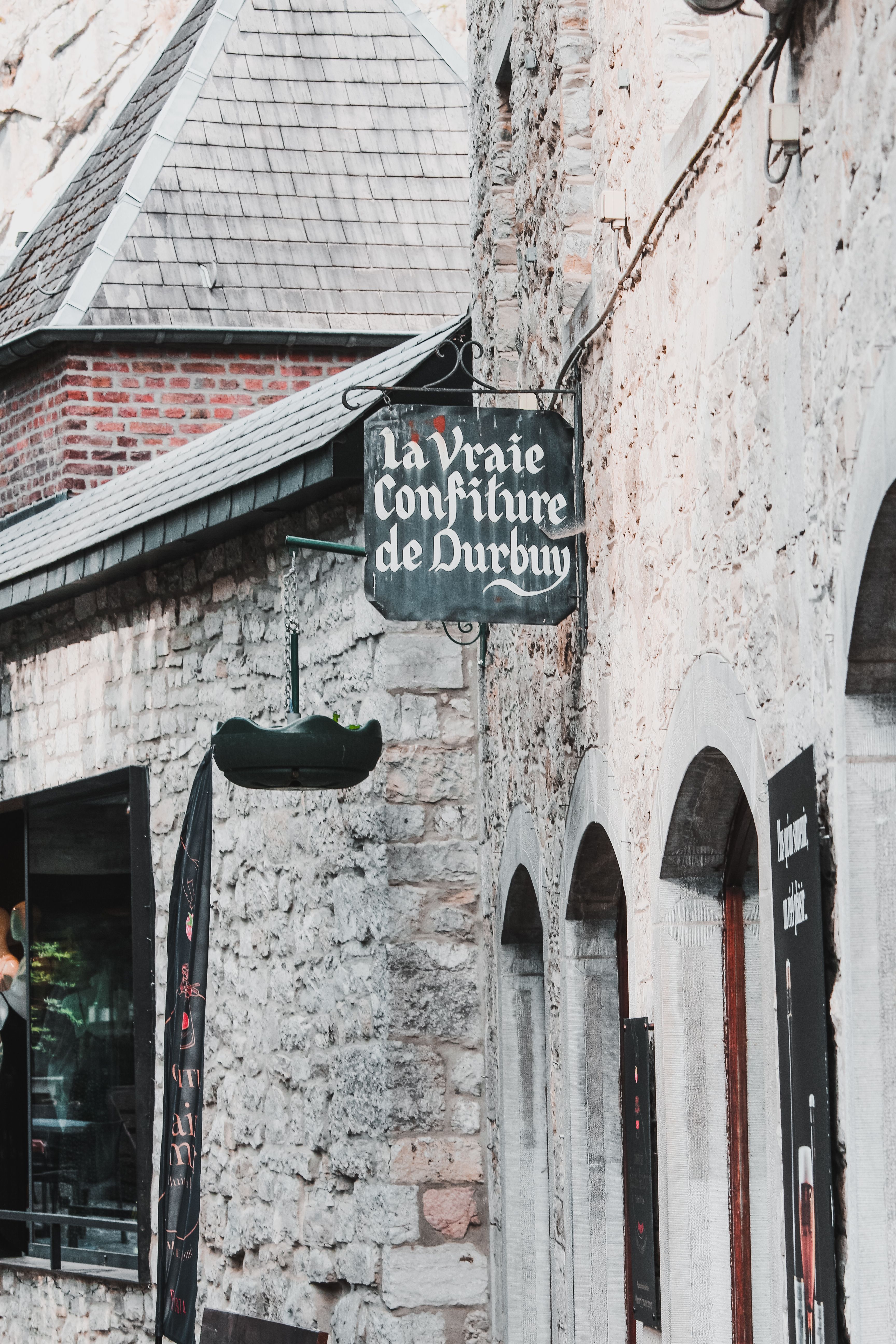 Explore the charm of historical facades in Durbuy, Belgium, featuring traditional architecture.