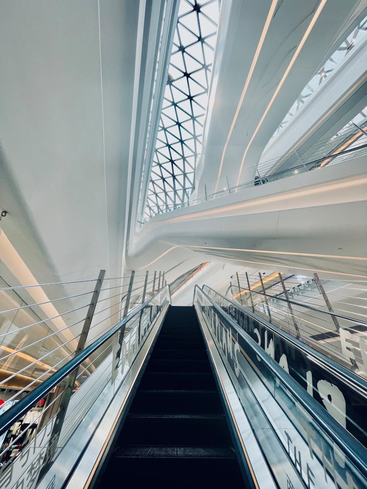 Interior Of A Modern Building With An Escalator