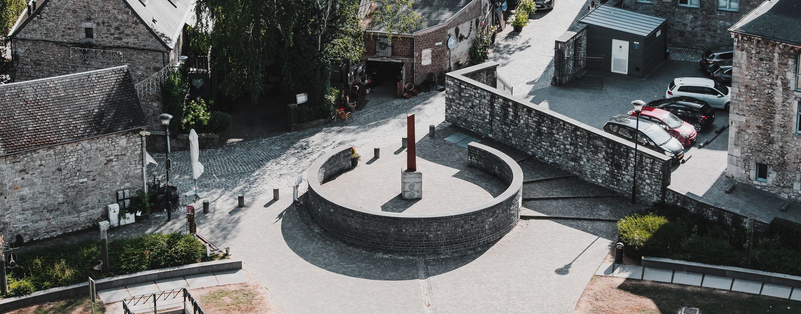 Aerial perspective of cobblestone streets and stone buildings in charming Durbuy, Belgium.