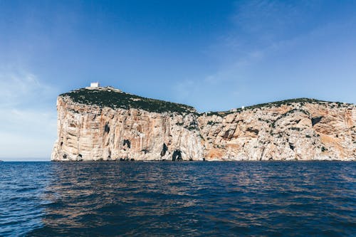 Безкоштовне стокове фото на тему «capo caccia, берег, море» стокове фото
