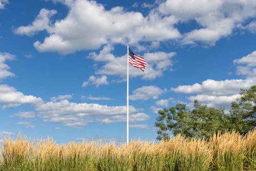 American Flag on a Grass Field