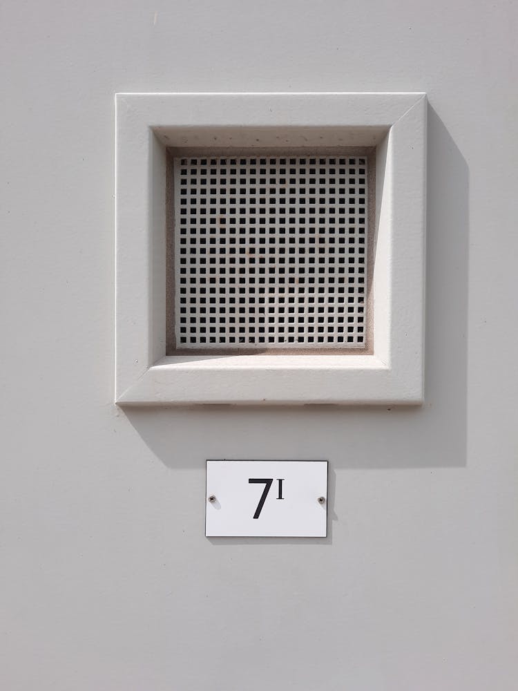 Number Hanging On House Doors With Ventilation