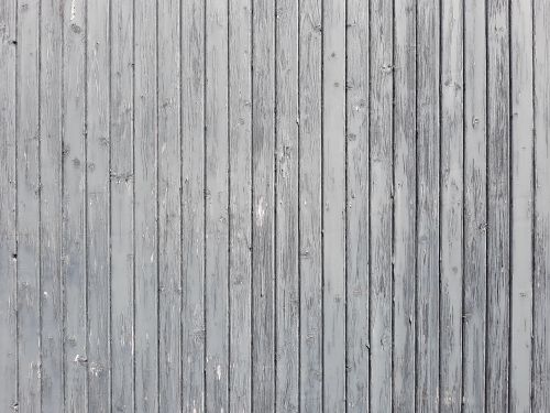 Free Detailed view of a weathered gray wooden plank wall showcasing natural texture and pattern. Stock Photo