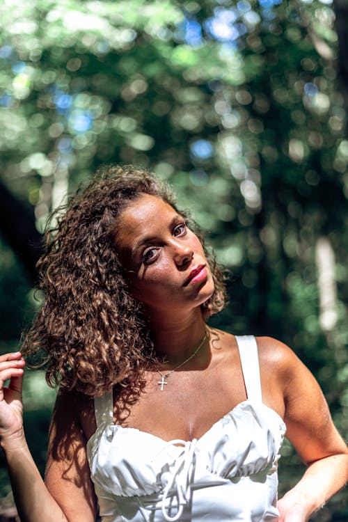 Close Up Photo of a Woman with Curly Hair