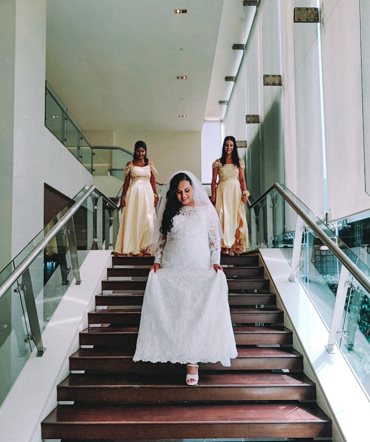 Women Going Down On The Stairs