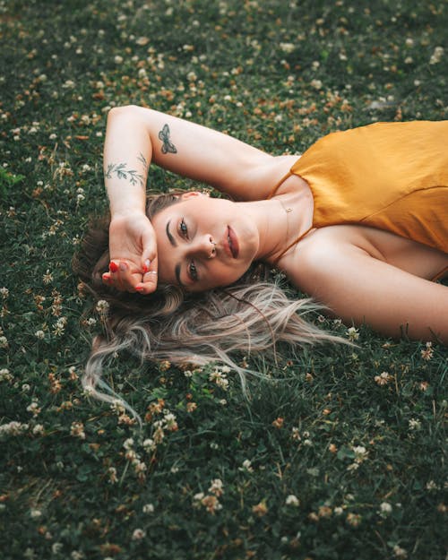 A Woman Lying on Grass