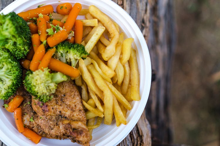 Sliced Meat With Vegetables And Potato Fries