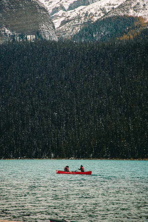People Canoeing in a River in the Banff National Park in Alberta, Canada
