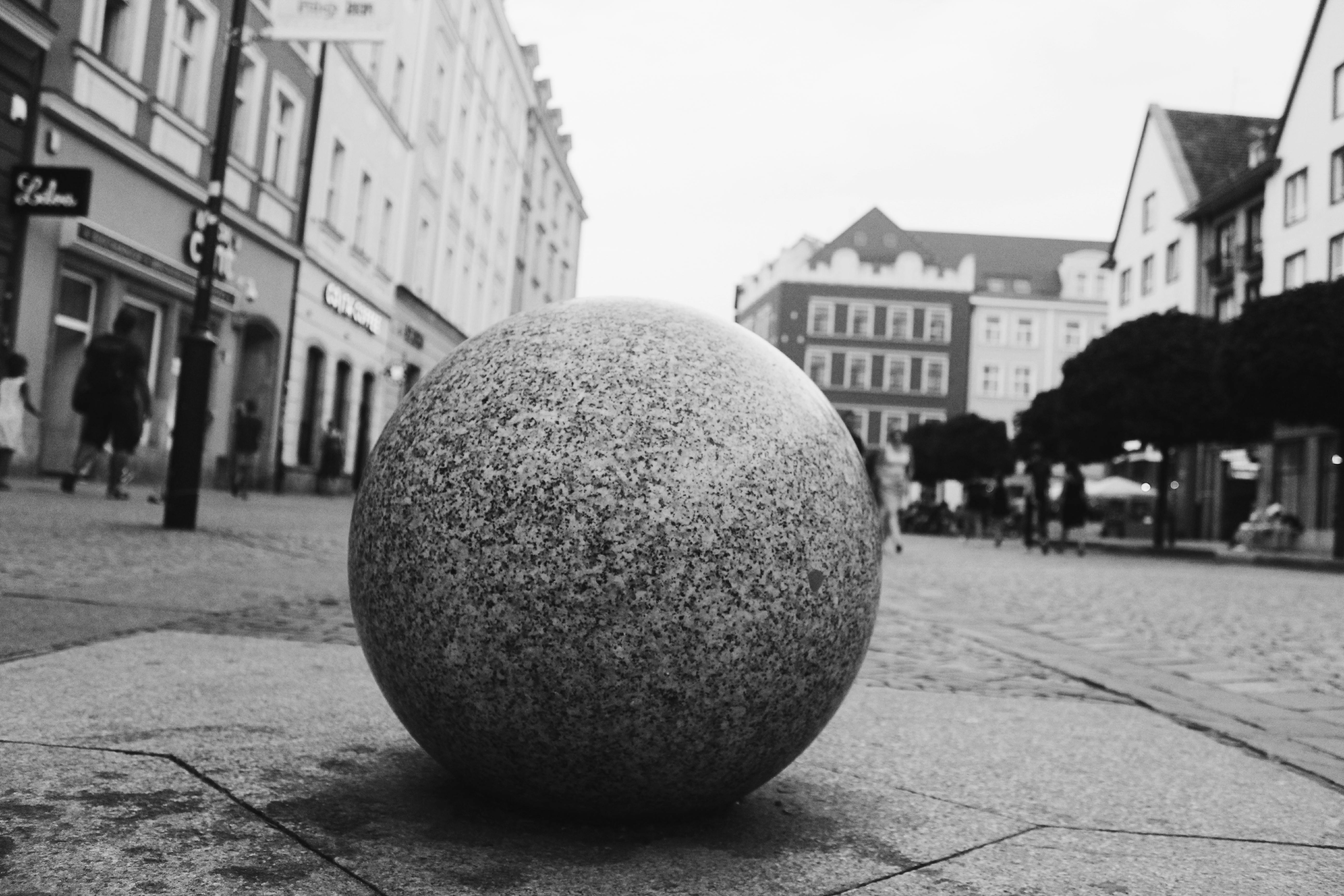 Round Ball In Grayscale Photography · Free Stock Photo