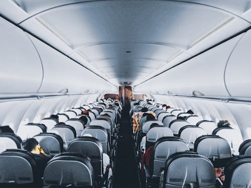 Free People Inside Commercial Air Plane Stock Photo
