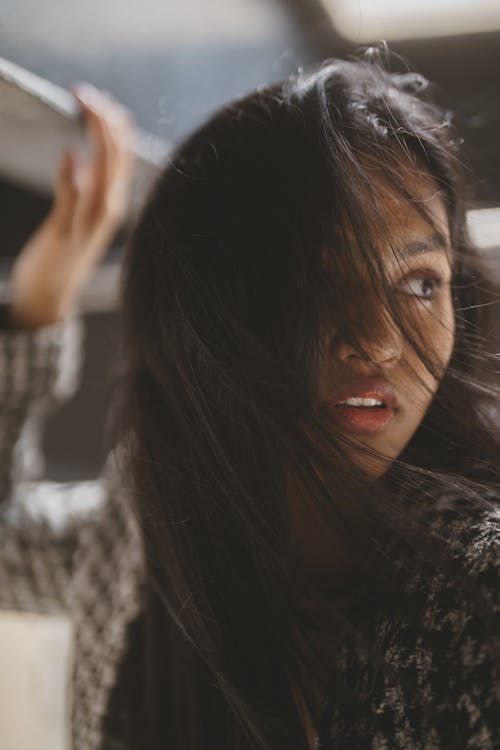 A Woman in Knitted Sweater