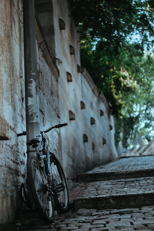 Gratuit Photos gratuites de bicyclette, mât, rue Photos