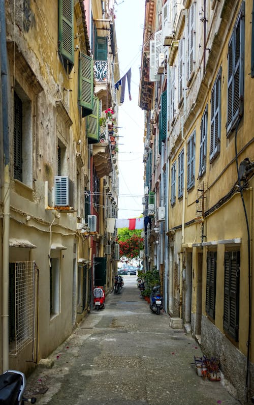 An Empty Street Between Buildings