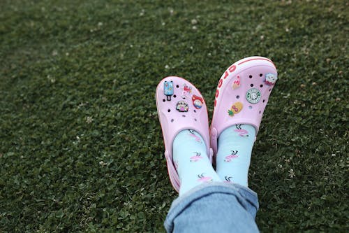 Free Feet in Pink Crocs Stock Photo