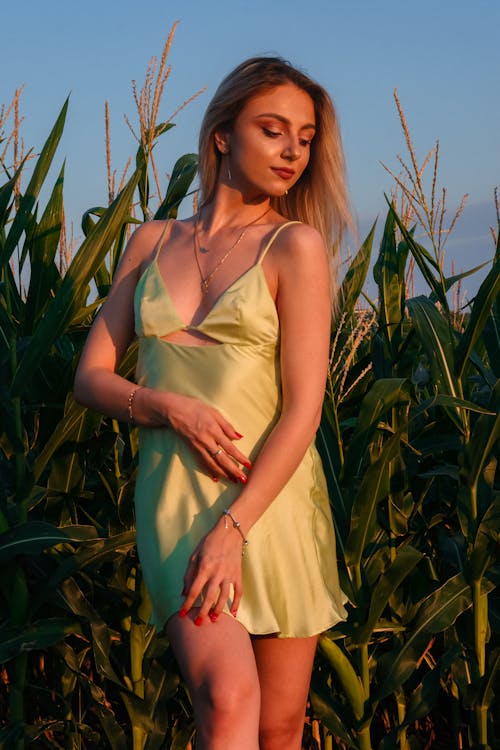 Beautiful Woman Wearing a Sexy Green Dress