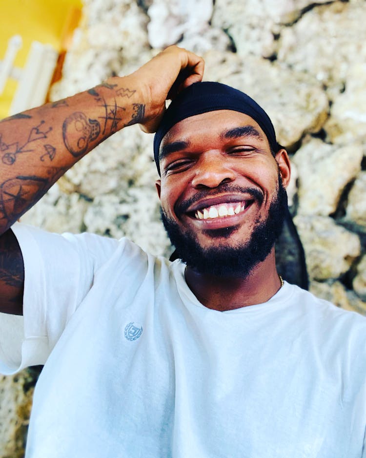 Close-up Of A Man With A Beard Smiling