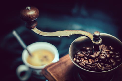 Free Selective Focus Photography of Vintage Brown and Gray Coffee Grinder Stock Photo