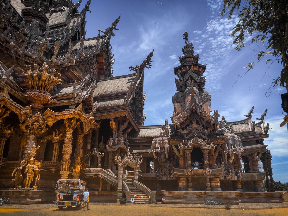 Intricate wooden architecture of the Sanctuary of Truth in Pattaya, Thailand, capturing stunning detail and craftsmanship.