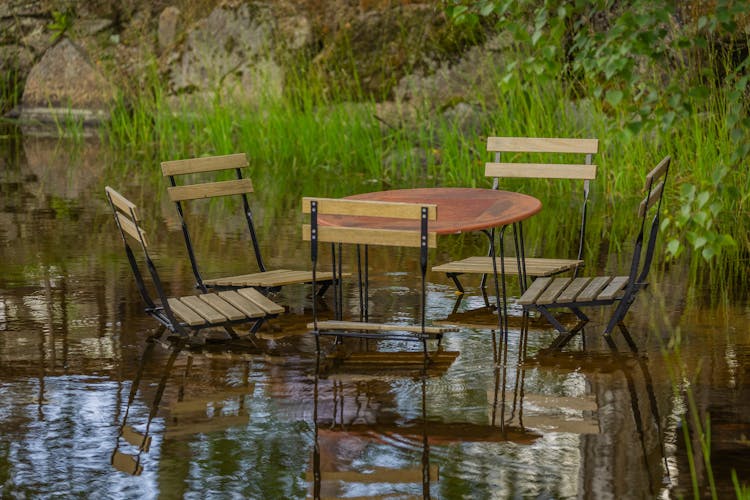 Table And Chairs In Water 