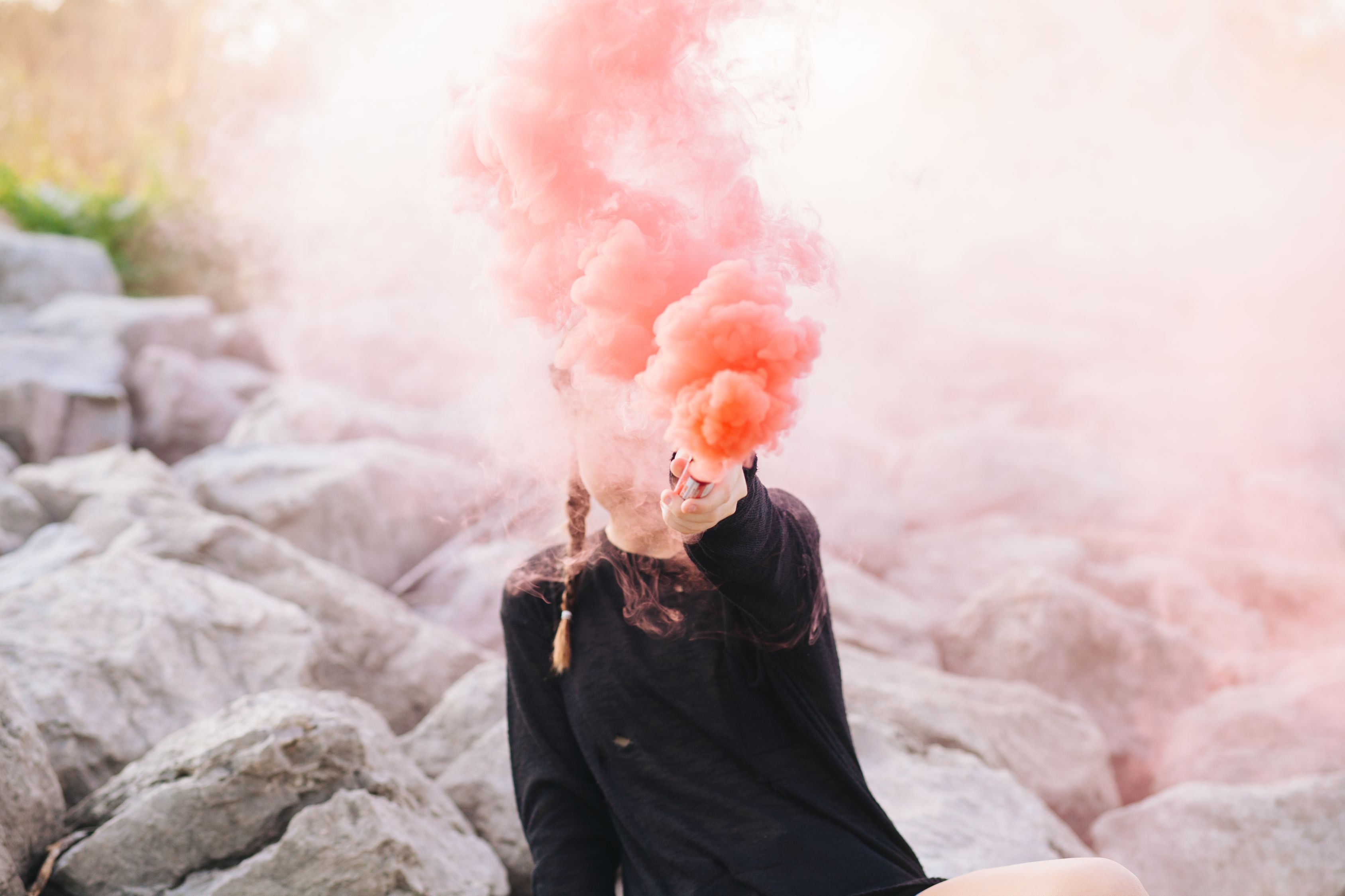 Woman Holding Color Smoke Grenade Free Stock Photo woman-holding-color-smoke-grenade-free-stock-photo